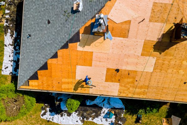 Roof repair by replacing old asphalt bitumen shingles